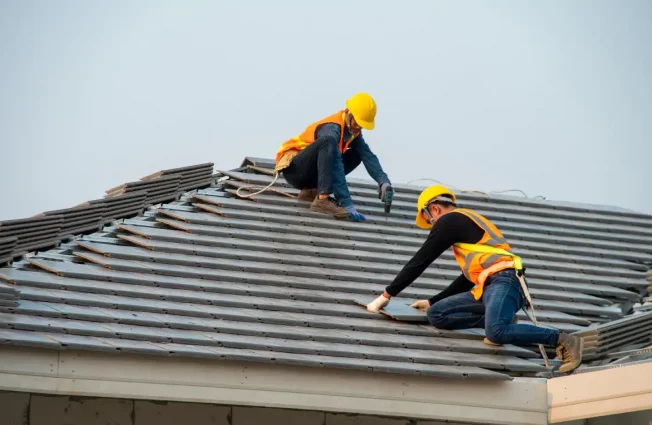 NAV Restoration installing roof tiles